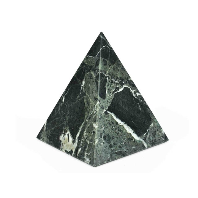 This handcrafted pyramid is a striking testament to natural artistry, featuring a sophisticated brecciated pattern that...