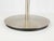 This "professional" table lamp is made from nickel metal and acrylic glass with pivotable lampshade. The lamp remains in...