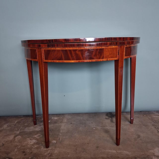 Period: Regency Year: circa 1820 Country of Origin: England Materials: Mahogany veneer, softwood carcass Top: Foldable...
