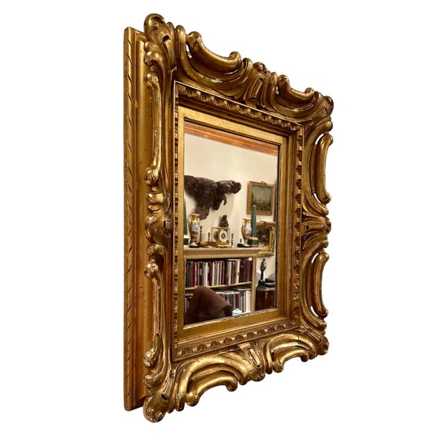 Venetian Sansovino Palatial Early Baroque Style Carved Giltwood Mirror. This is a magnificent antique Venetian Sansovino...