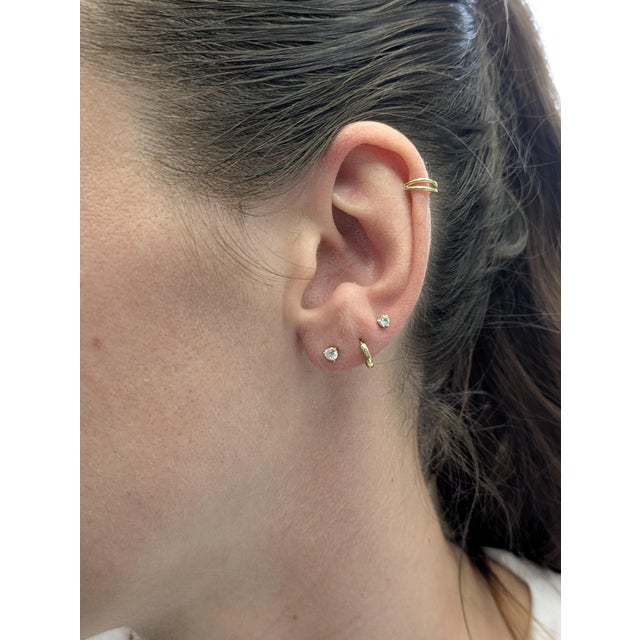 Simple yet stunning, these 14k gold martini studs feature 3mm round lab-created diamonds in a secure 3-prong setting....