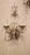 This listing features a pair of elegant metal and glass sconces each with two lights. The style these sconces are inspired...