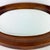 Add timeless charm to your space with this authentic Tell City Chair Company oval wall mirror, crafted in the USA from...