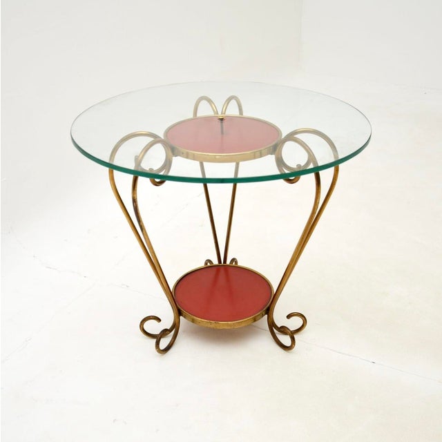 A stylish and extremely well made vintage Italian brass and glass coffee / occasional table. This was recently imported...