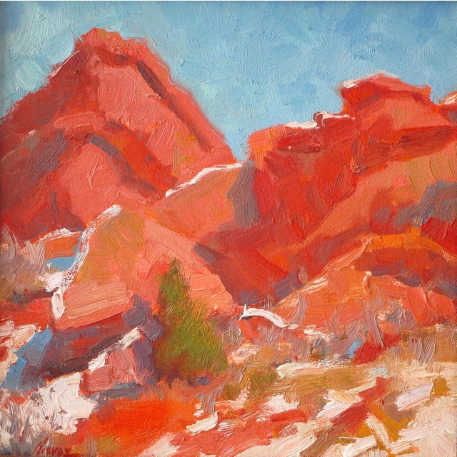 This artwork depicts a vibrant landscape of red rock formations, characterized by bold strokes and a rich palette that...