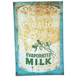 Mid-Century Metal Carnation Milk Sign For Sale