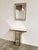 A highly decorative vintage mirrored console by Deknudt, Belgium, combining Hollywood Regency glamour with clever...