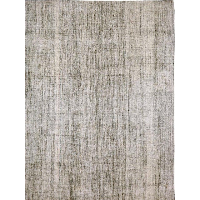 A vintage Turkish flat-woven Kilim carpet from the mid-20th century. All natural undyed wool, featuring a beautiful salt...