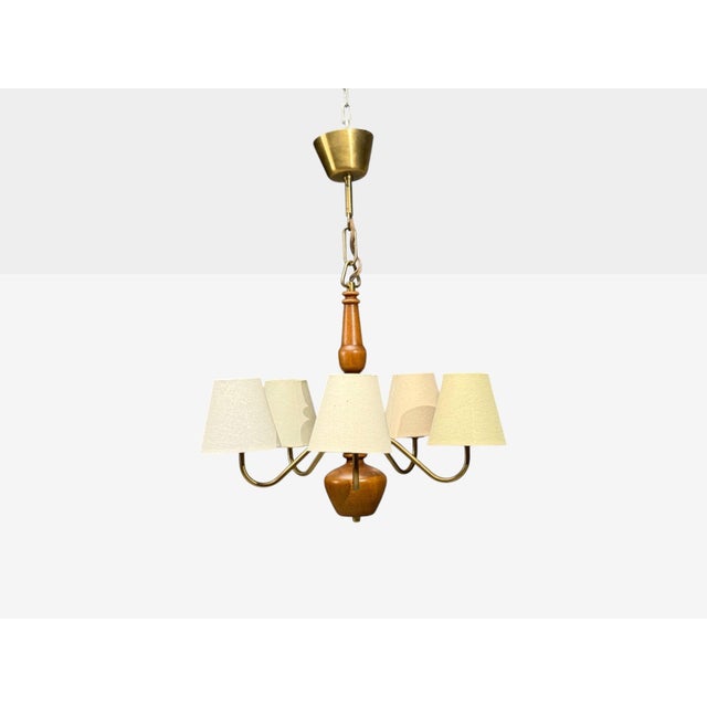 Hans Bergström Attribution, Swedish Mid-Century Modern, Pendant Light, Brass, Stained Wood, Sweden, 1940s A five arm brass...