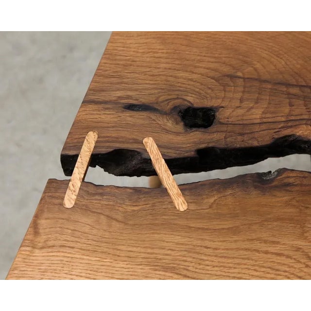 Side table with white oak burl top, stretchers and curly white oak legs by Michael Rozell. This piece is attributed to the...