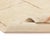 Barely-there lines trace a soft grid across an ivory field, with whispers of tender peach lending warmth to this quietly...