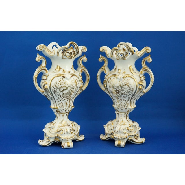 Item description: Fabulous antique pair of Louis XVI double-handled vases in hard-paste porcelain, made in full Rococo...
