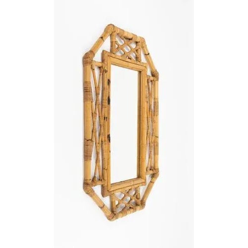 Midcentury amazing geometric wall mirror in bamboo and rattan attributed to Vivai Del Sud. Made in Italy in the 1970s....