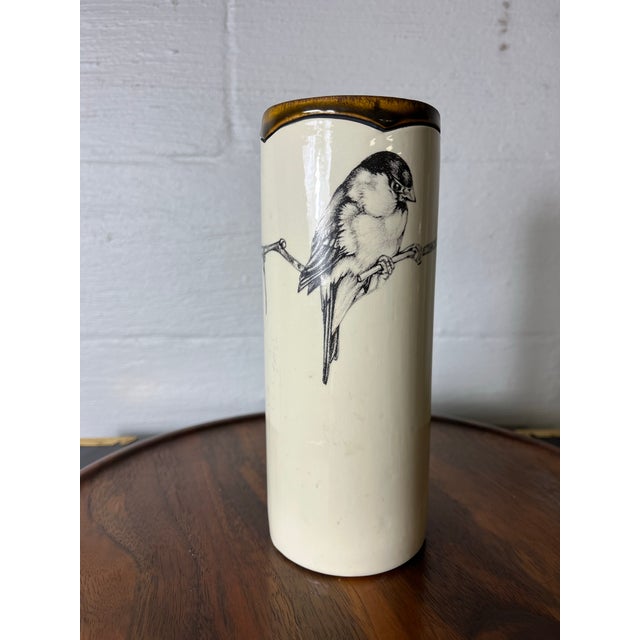 This exquisite cylinder-shaped vase from Laura Zindel Design features a finely detailed graphite pencil illustration of a...