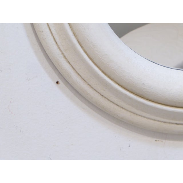 This whitewashed convex mirror is 14.5" in diameter.