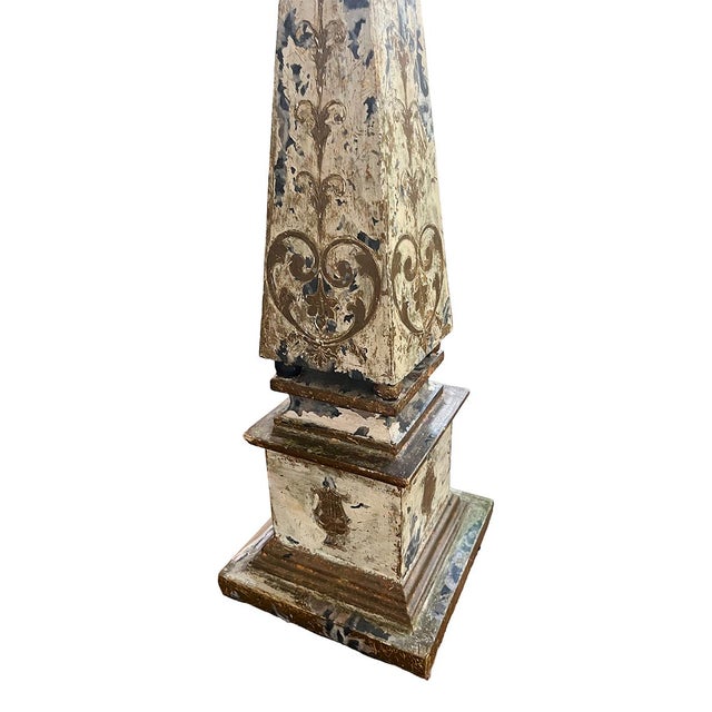 The bases of the lamps are painted and gilt wood. They have been paired with cream shades. Overall: 7”w x 18”d x 37”h...