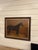 Charming vintage equestrian oil painting depicting a horse standing in a stable courtyard, rich with warm tones and rustic...