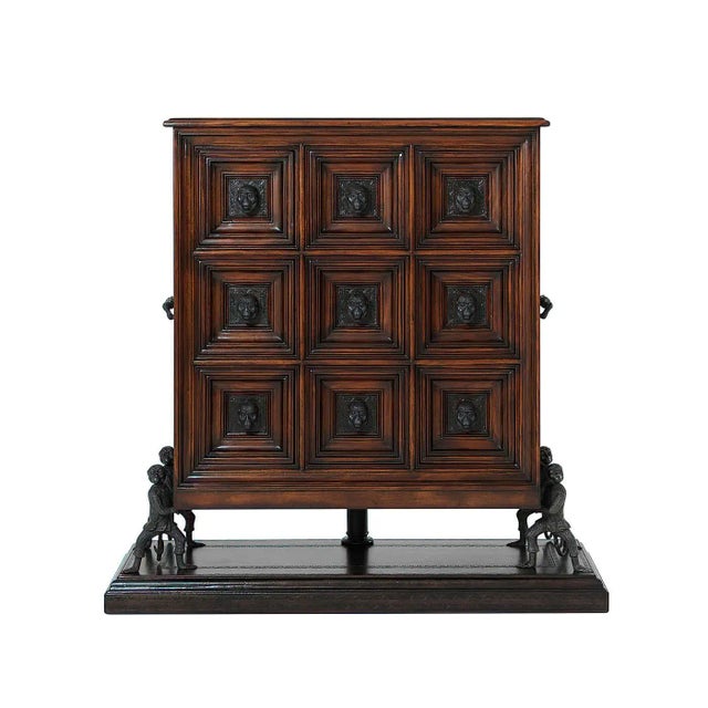 An unusual Italian 19th-century style leather panel chest on stand, with nine drawers having monkey head handles, on four...