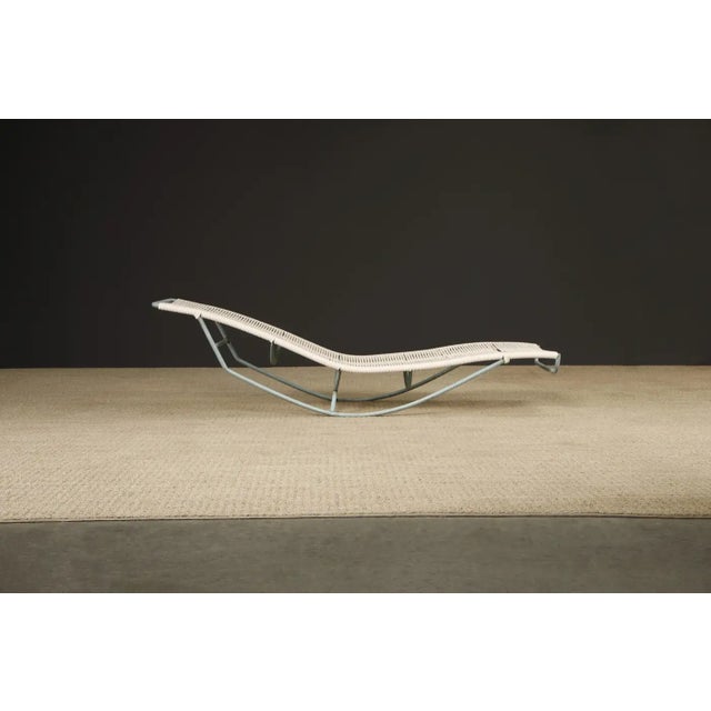 Sculptural bronze 'Waikiki' rocking chaise lounge by Walter Lamb for Brown Jordan. These collectible examples of...