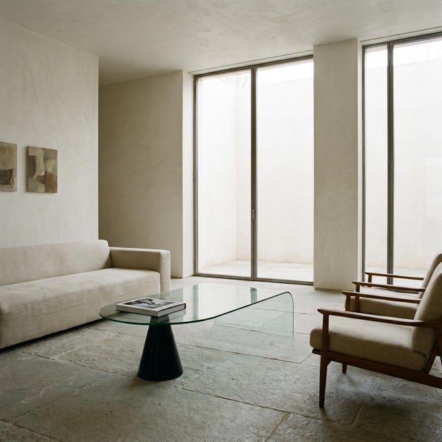 A sophisticated Italian table from the 1970s, inspired by the radical and refined language of Massimo Vignelli, a key...