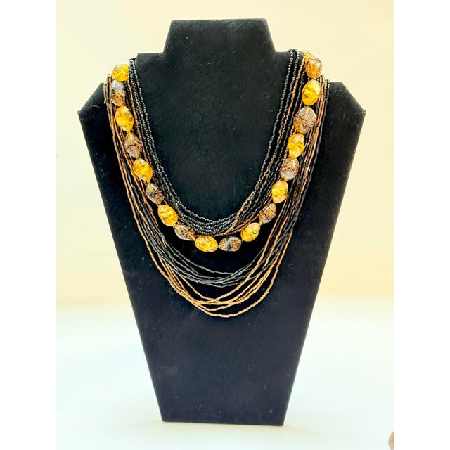 A stunning, authentic mid-century demi parure by the highly collectible designer Alice Caviness. This masterfully crafted...
