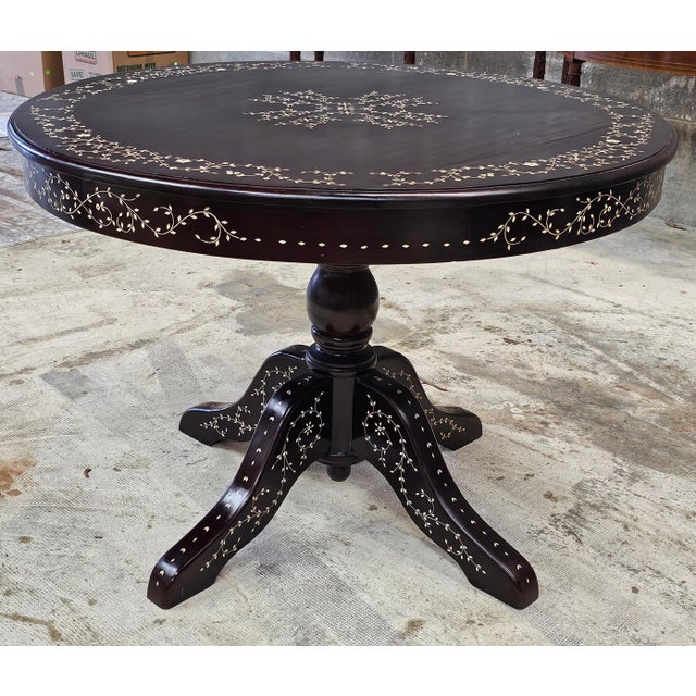 South East Asian Handcrafted Bone Marquetry Rosewood Center Table Breakfast Tabl Measures 42" in width, 42" in depth and...