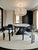 Sophisticated materials draw inspiration from modern geometry to create this stunning dining room set for six people. The...