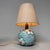 Timeless ceramic ambiance lamp from Italy, dating back to the '50s-'60s. Beautifully designed turquoise base with a floral...