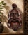 A wonderfully expressive vintage Chinese hand-carved hardwood wall mask depicting a smiling sage or elder. Full of...