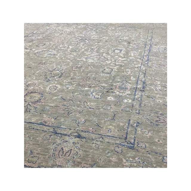 Exact Size: 8'10" x 11'10" Age: New Materials: Wool and Bamboo Silk Construction: Hand Knotted Origin: India Care Guide:...
