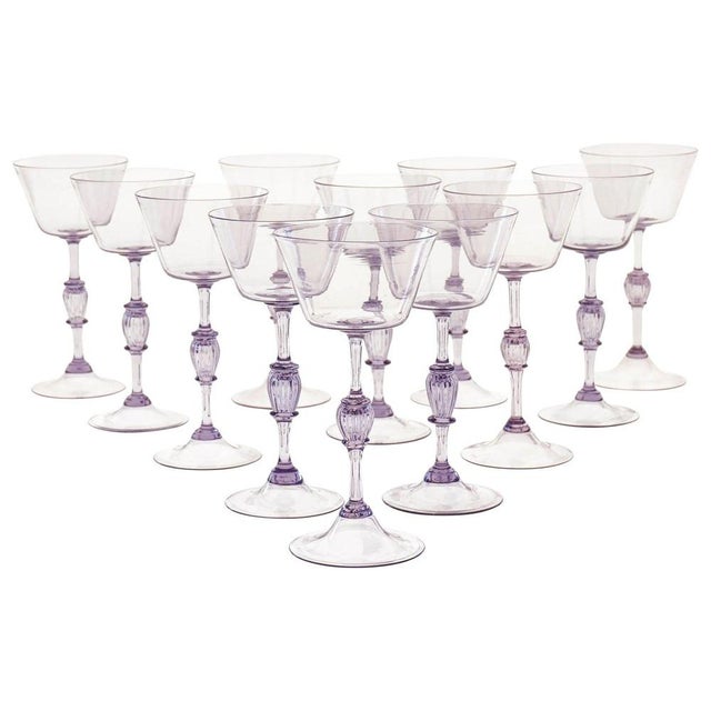 We present to you a unique and rare set of 12 cyclamen glass flutes. Made in Murano in the 1950s by Cenedese. It is almost...