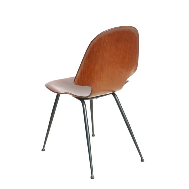 Plywood seat and black iron frame. Resturation like the picture.