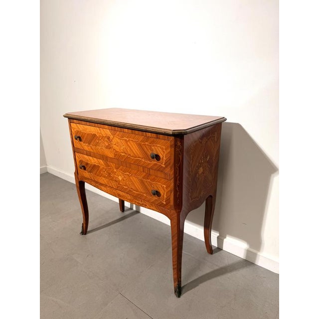 Elegant french louis xv style marquetry chest of drawers, crafted with beautiful book-matched veneers and intricate floral...