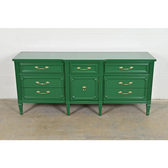 A gorgeous French Regency Louis XVI style long dresser or credenza By Thomasville USA, Circa 1960s Green lacquered carved...