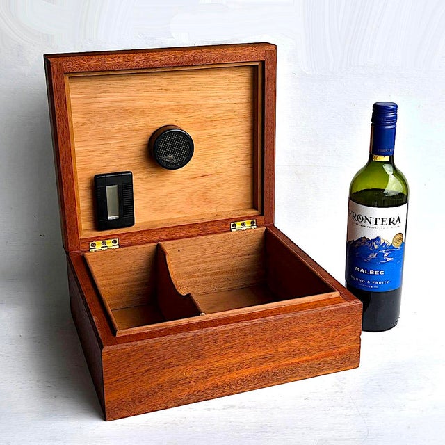 Offered is a lovely tropical hardwood cigar humidor with Spanish Cedar lining. It appears to be hand made, possibly custom...