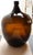 French Demijohn / Carboy originally used for transporting wine (early 20th Century, France). Composed of attractive amber...