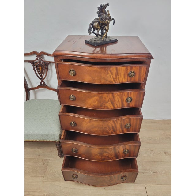 This is a gorgeous mid 20th-century chest of drawers with many timeless and quality Vintage features that are sure to...