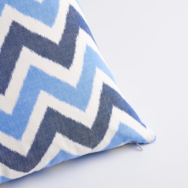 This pillow features Vedado Ikat with a knife edge finish. This happy ikat chevron stripe is a best-of-both-worlds...