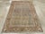 This mid-20th-century Persian Malayer accent rug presents a finely ordered allover composition across a soft blue field....