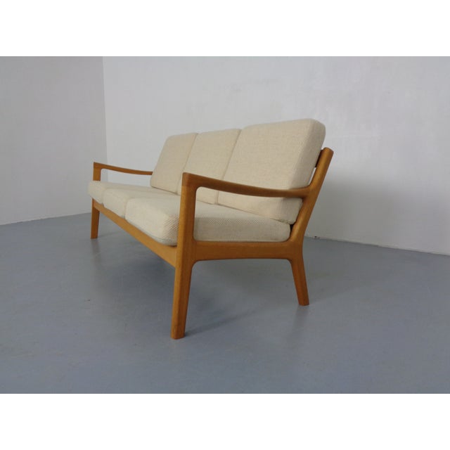 Ole Wanscher sofa in oak from the 60s. Original pillow with spring core and zippers. The oak wood and the cushions are in...