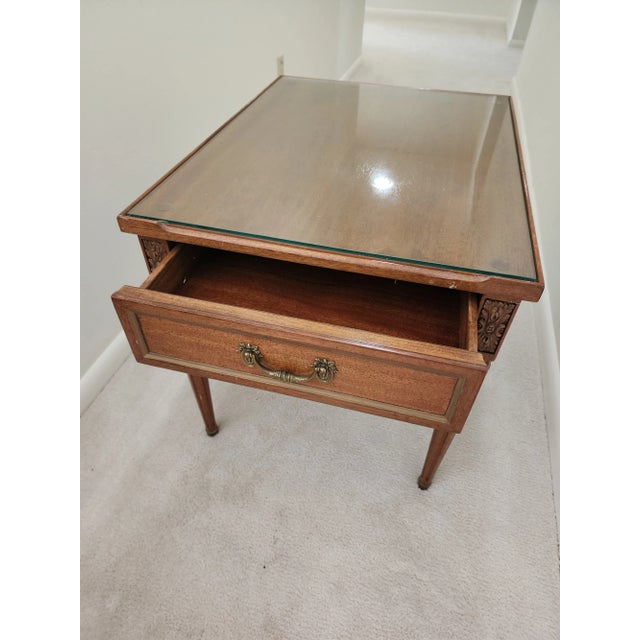 Beautiful Henredon Neo Classical Style side table. In excellent condition. Comes with glass top that has protected the top...