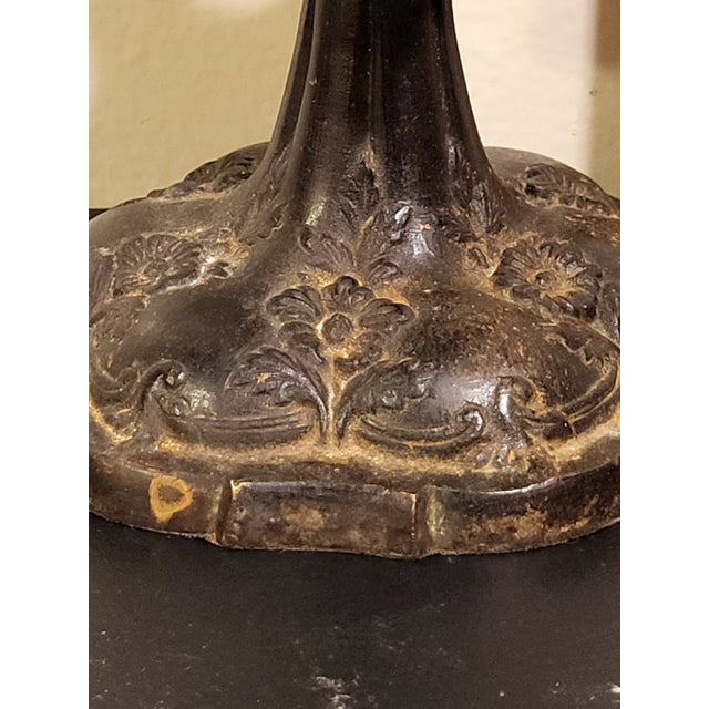 This is a ornate bronze base holder which is used for a French Epergne glass vase. It is masterfullly decorated with...