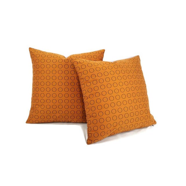 From Hella Jongerius for Maharam is Repeat Dot Ring in Sienna pillow cover. This is a modern pattern of circle dots on a...