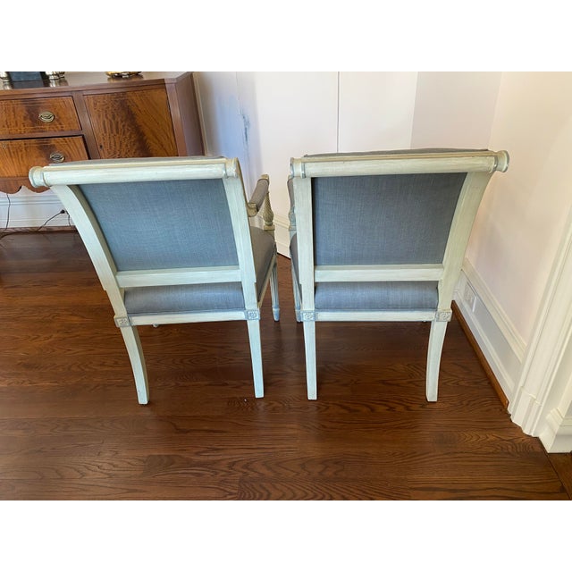 Cream colored dining / accent chairs with slate blue accents and coordinated solid fabric (glazed linen). Chairs were...