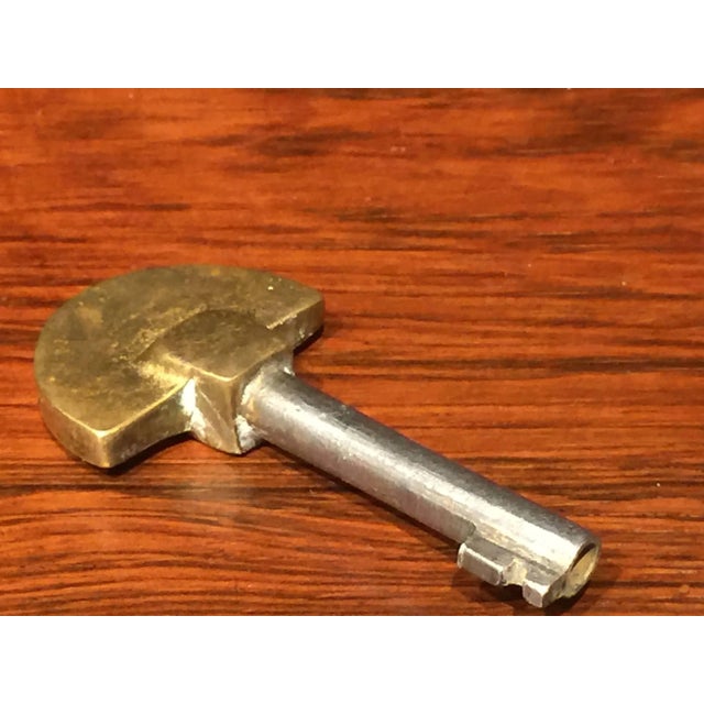French Art Deco Rosewood desk and bookcase ,in two-piece. The tiered bookcase with six half-moon shelves to the left and...