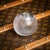 Antique 20th century silver mounted and textured glass match striker. Of round shape, mounted with a plain silver collar....
