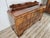 An elegant and impressive 1940s French sideboard, featuring a refined Art Deco style and a splendid walnut veneer,...