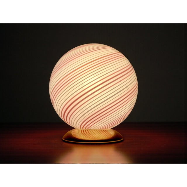 An iconic piece of Italian design from the 1970s and 1980s, it's crafted from fine art glass with a swirl pattern,...