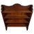 A handsome early 20th-century English open bookcase, finely constructed from oak and distinguished by its restrained...