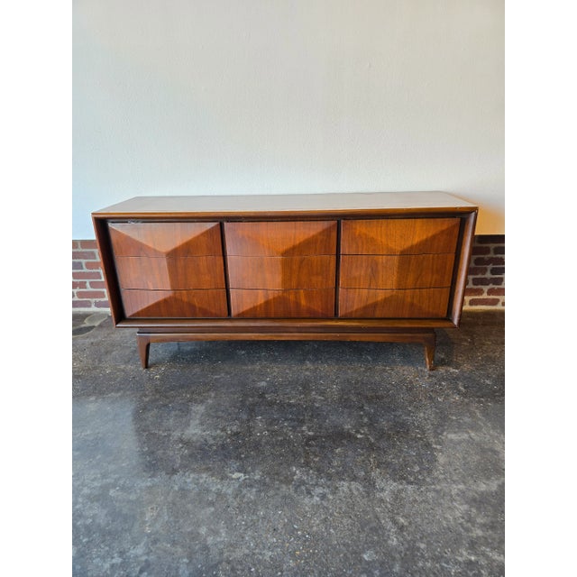 Highly sought after 9-drawer Diamond design walnut MCM dresser by United Furniture. *We have the matching tall dresser...